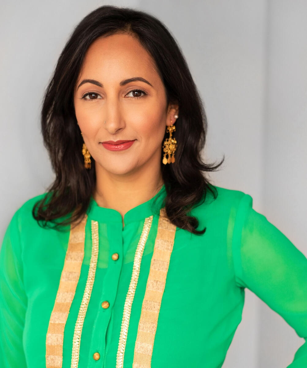 Actress Salma Dharsee wearing a green outfit.